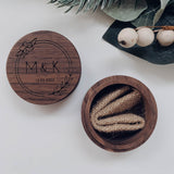 Gorgeous circle walnut wooden engraved ring box. NZ's finest range of wood engraved ring boxes.