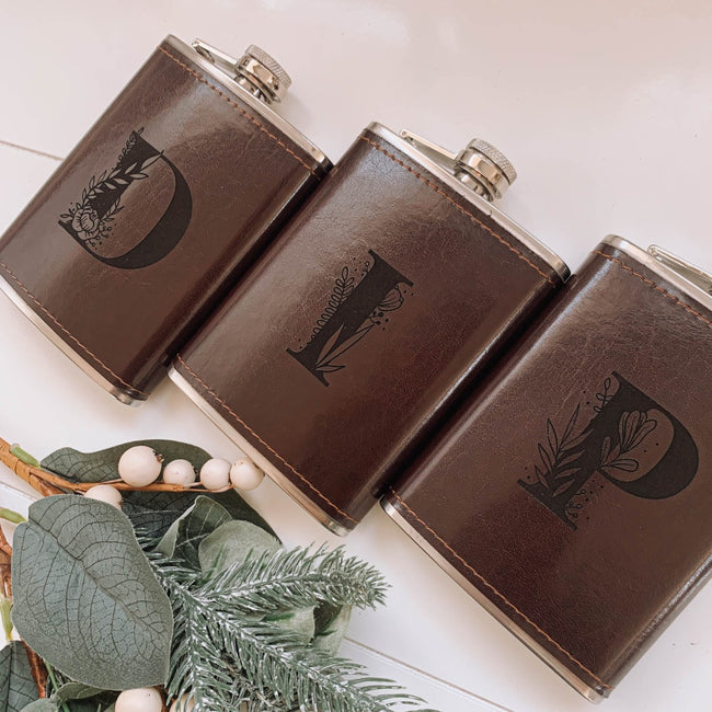 Looking for the perfect groomsman and best man gift? Grab these customised engraved leather flasks today.